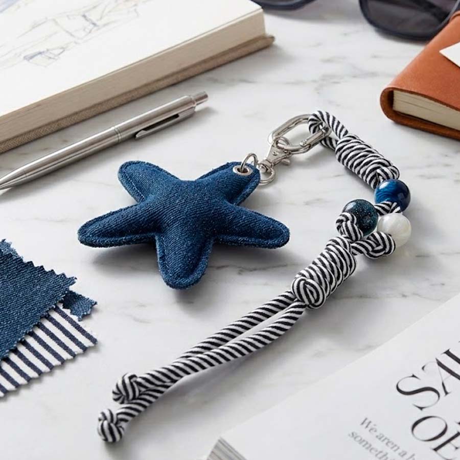 Charm colgante estrella - detalle del acabado brillante